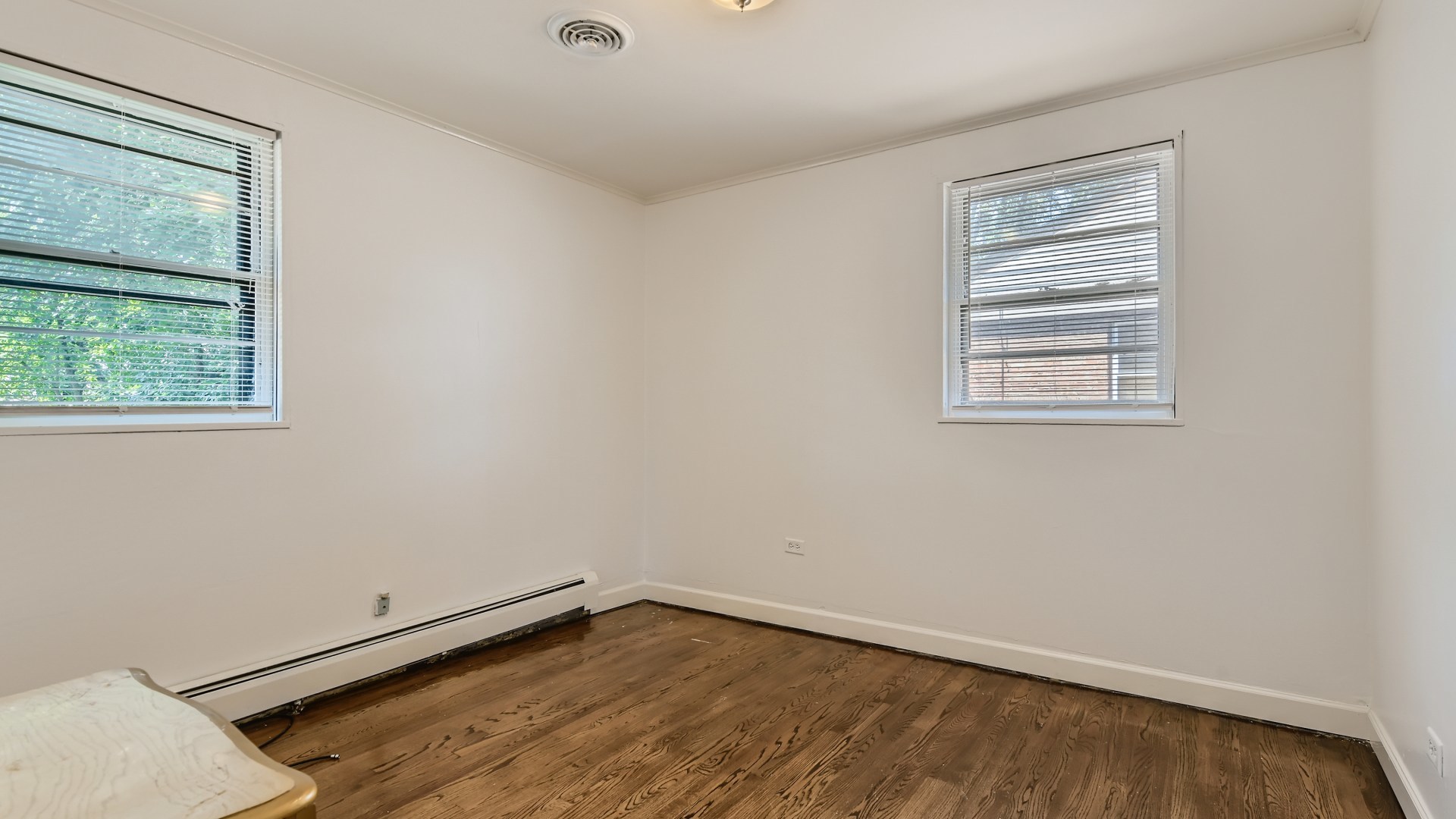 10718 South Pulaski Road Oak Lawn, IL 60453 - Photo 20 of 28 an empty room with a window