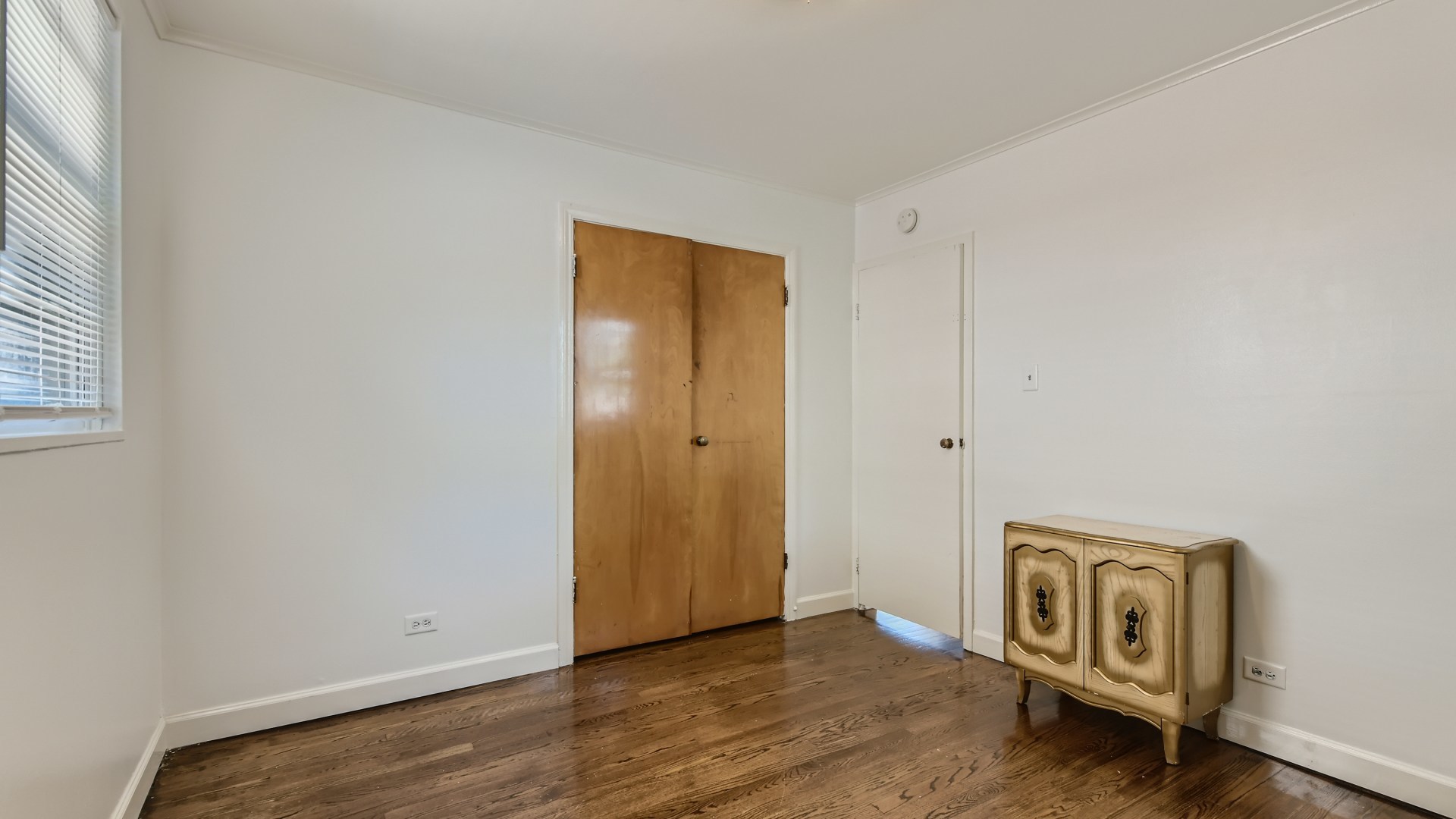 10718 South Pulaski Road Oak Lawn, IL 60453 - Photo 22 of 28 a view of an empty room with wooden floor