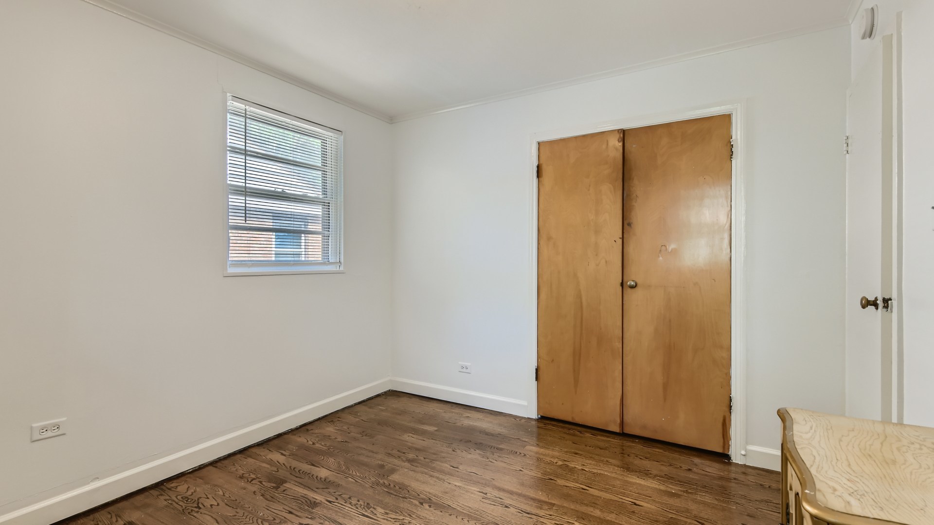 10718 South Pulaski Road Oak Lawn, IL 60453 - Photo 23 of 28 an empty room with wooden floor and windows