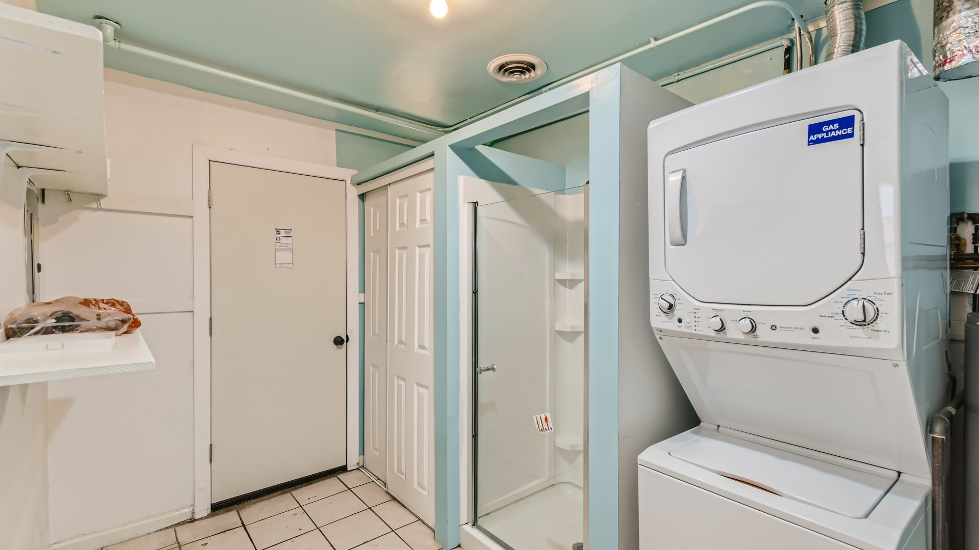 10718 South Pulaski Road Oak Lawn, IL 60453 - Photo 24 of 28 a bathroom with a washer and dryer