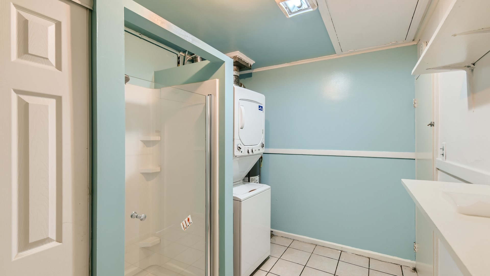 10718 South Pulaski Road Oak Lawn, IL 60453 - Photo 25 of 28 a bathroom with a shower and a sink
