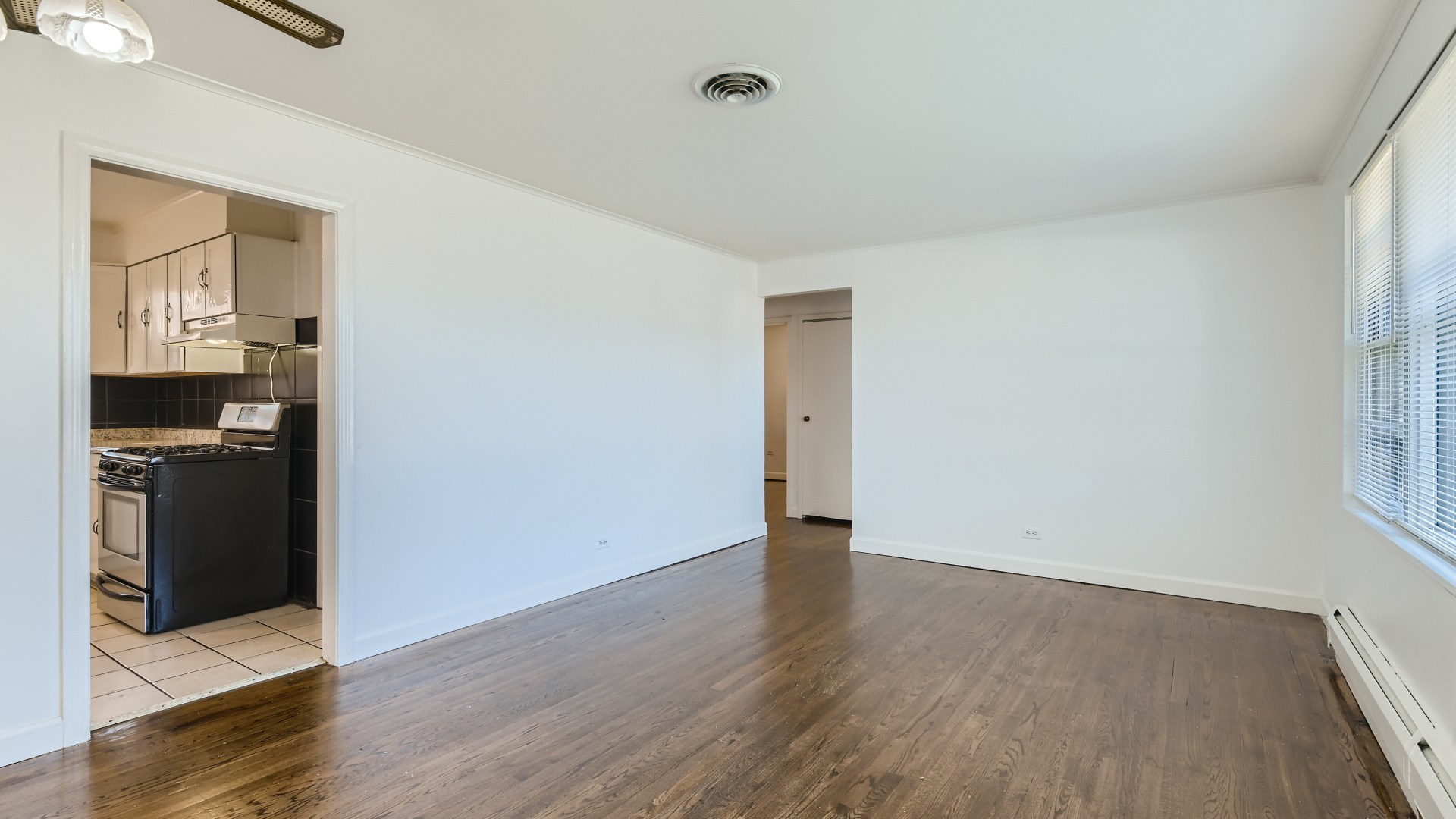 10718 South Pulaski Road Oak Lawn, IL 60453 - Photo 6 of 28 wooden floor in an empty room