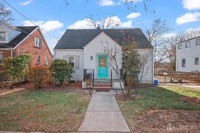 a front view of house with garden