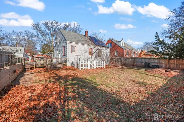 a view of street with large trees