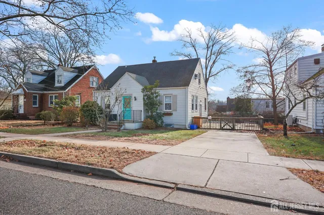 a house with trees in the background