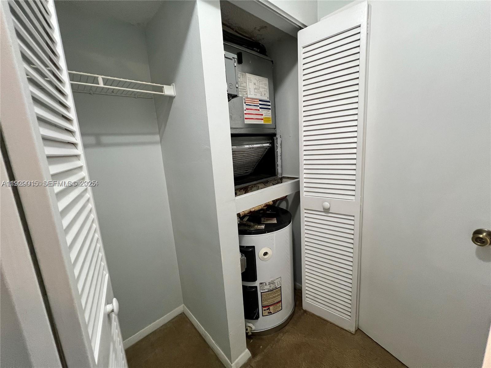 665 Southwest 113th Way, Unit 665 Pembroke Pines, FL 33025 - Photo 15 of 24 a view of walk in closet