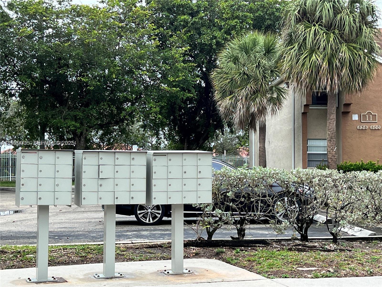 665 Southwest 113th Way, Unit 665 Pembroke Pines, FL 33025 - Photo 23 of 24 a view of a house with street