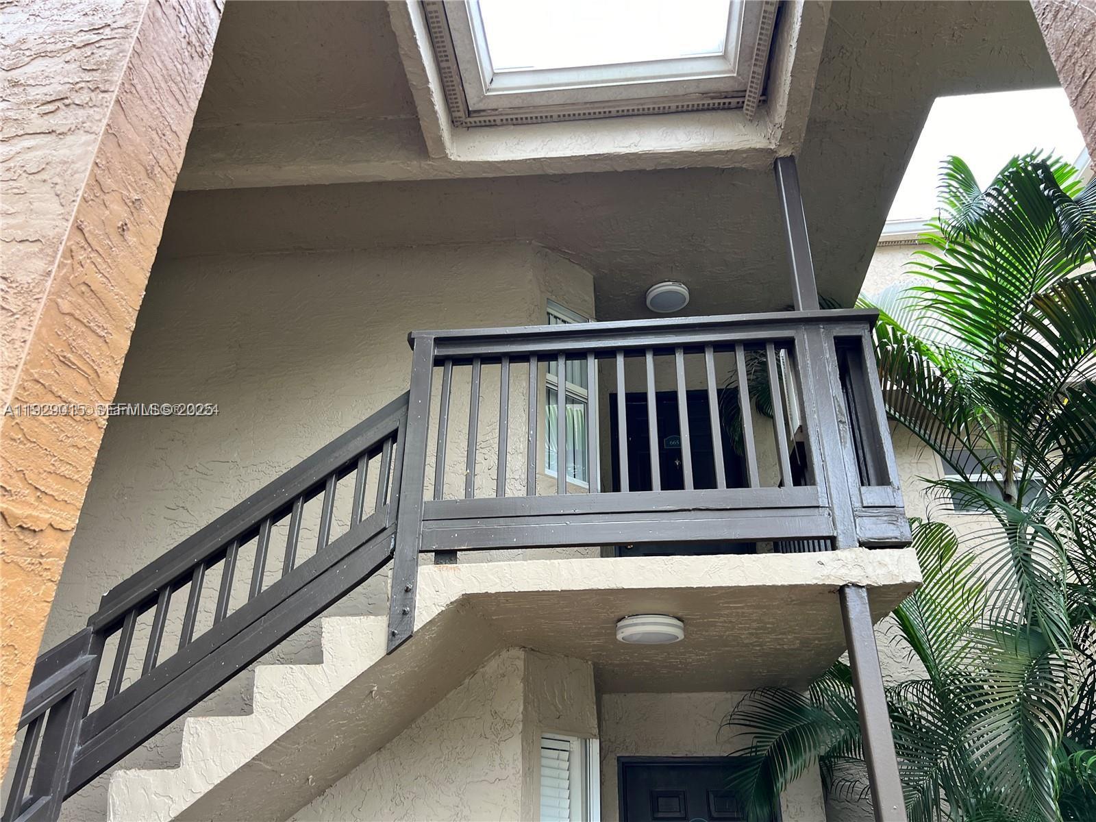 665 Southwest 113th Way, Unit 665 Pembroke Pines, FL 33025 - Photo 3 of 24 a view of balcony