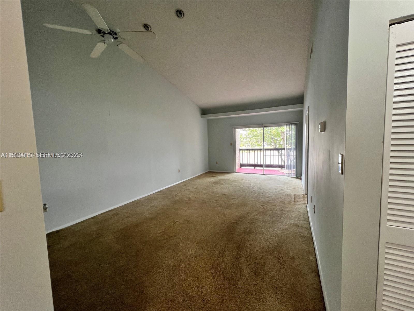 665 Southwest 113th Way, Unit 665 Pembroke Pines, FL 33025 - Photo 10 of 24 an empty room with windows