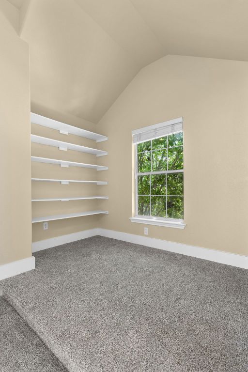 10128 Channel Island Drive Austin, TX 78747 - Photo 17 of 39 a view of an empty room with a window