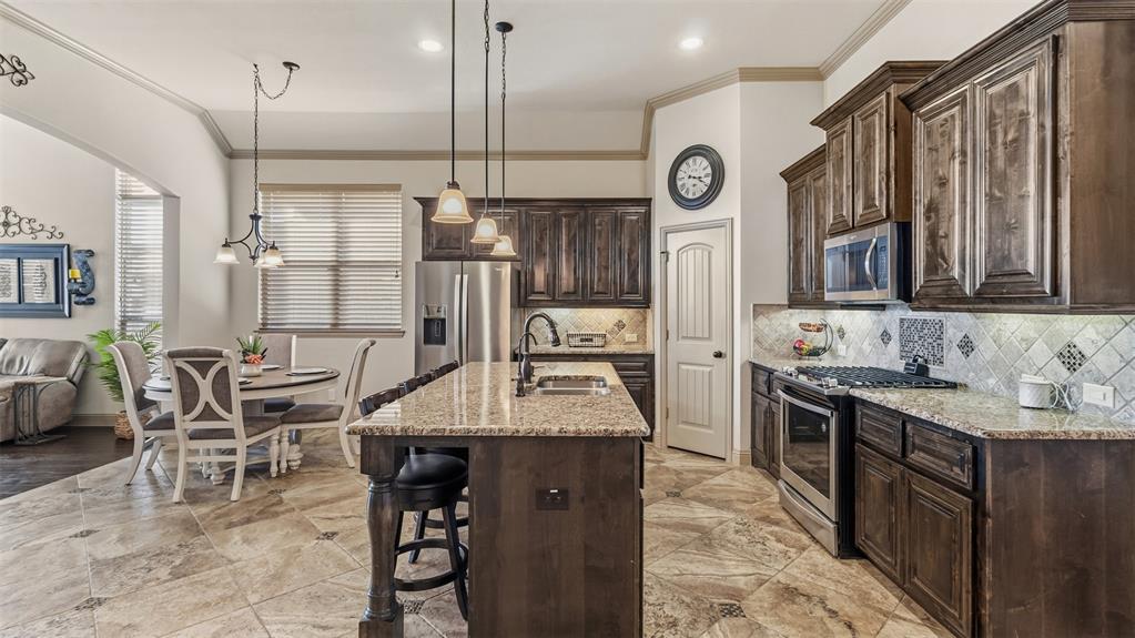 509 Alice Lane Fate, TX 75189 - Photo 6 of 36 Gas range with walk in pantry