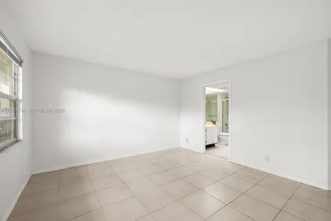 an empty room with a natural light