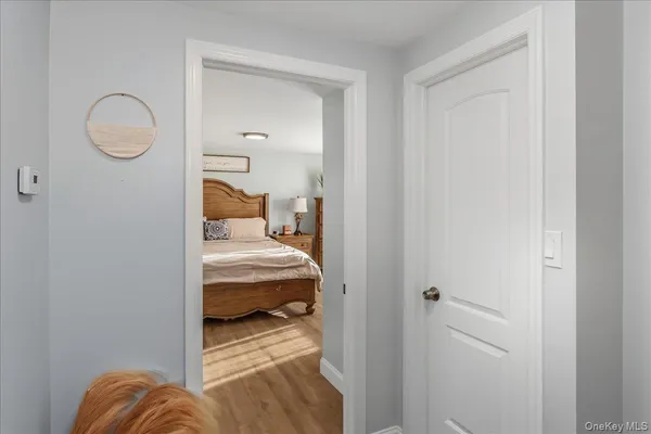 a bedroom with a bed and gym equipment