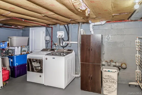 a kitchen with a stove and a refrigerator