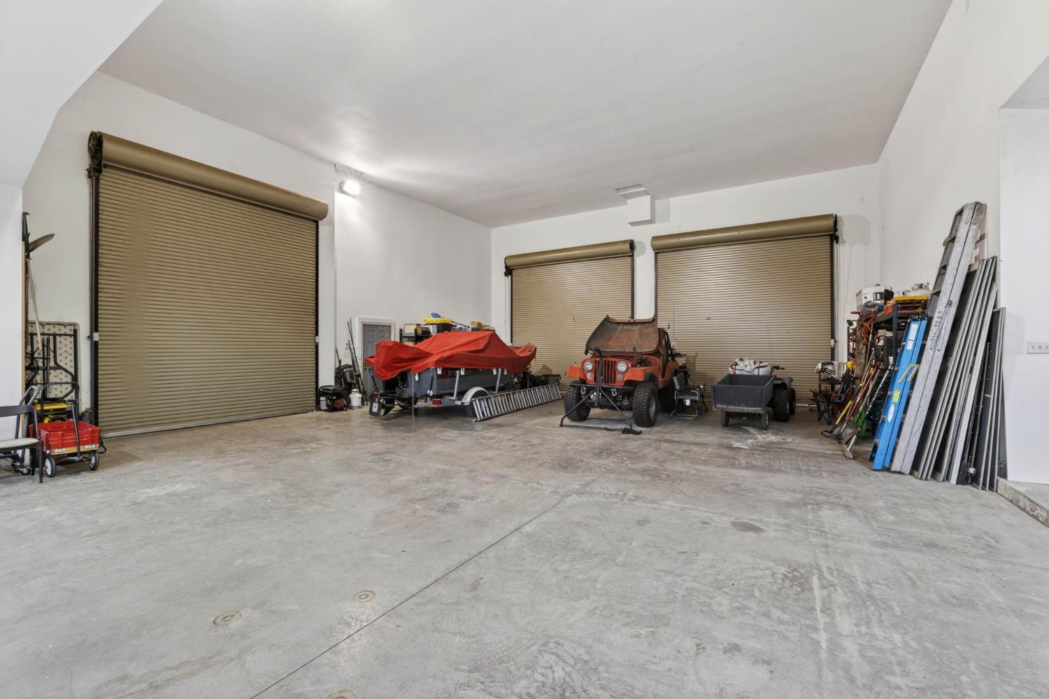 7021 Horseshoe Bar Road Loomis, CA 95650 - Photo 45 of 77 The garage is over 2200 sq ft with three 14' commercial grade roll up doors