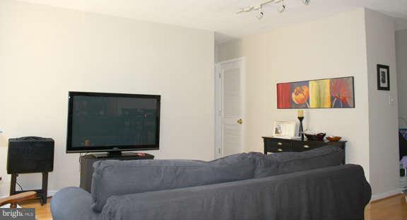 1800 R Street Northwest, Unit 604 Washington, DC 20009 - Photo 4 of 21 Living Room toward the bedroom