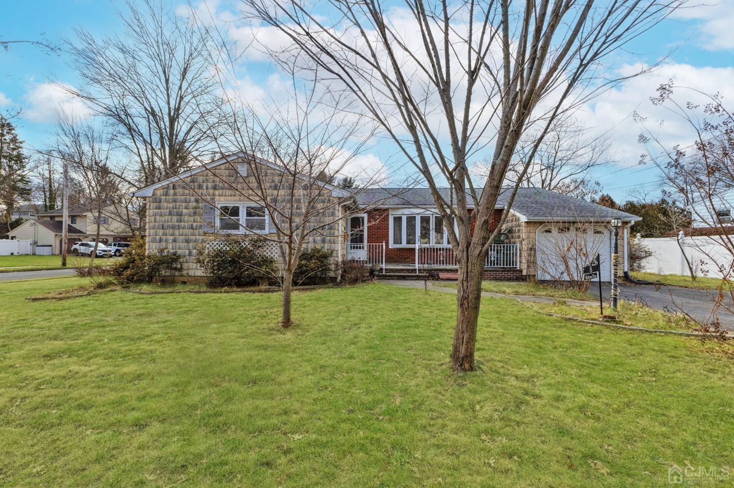 a house with trees in front of it