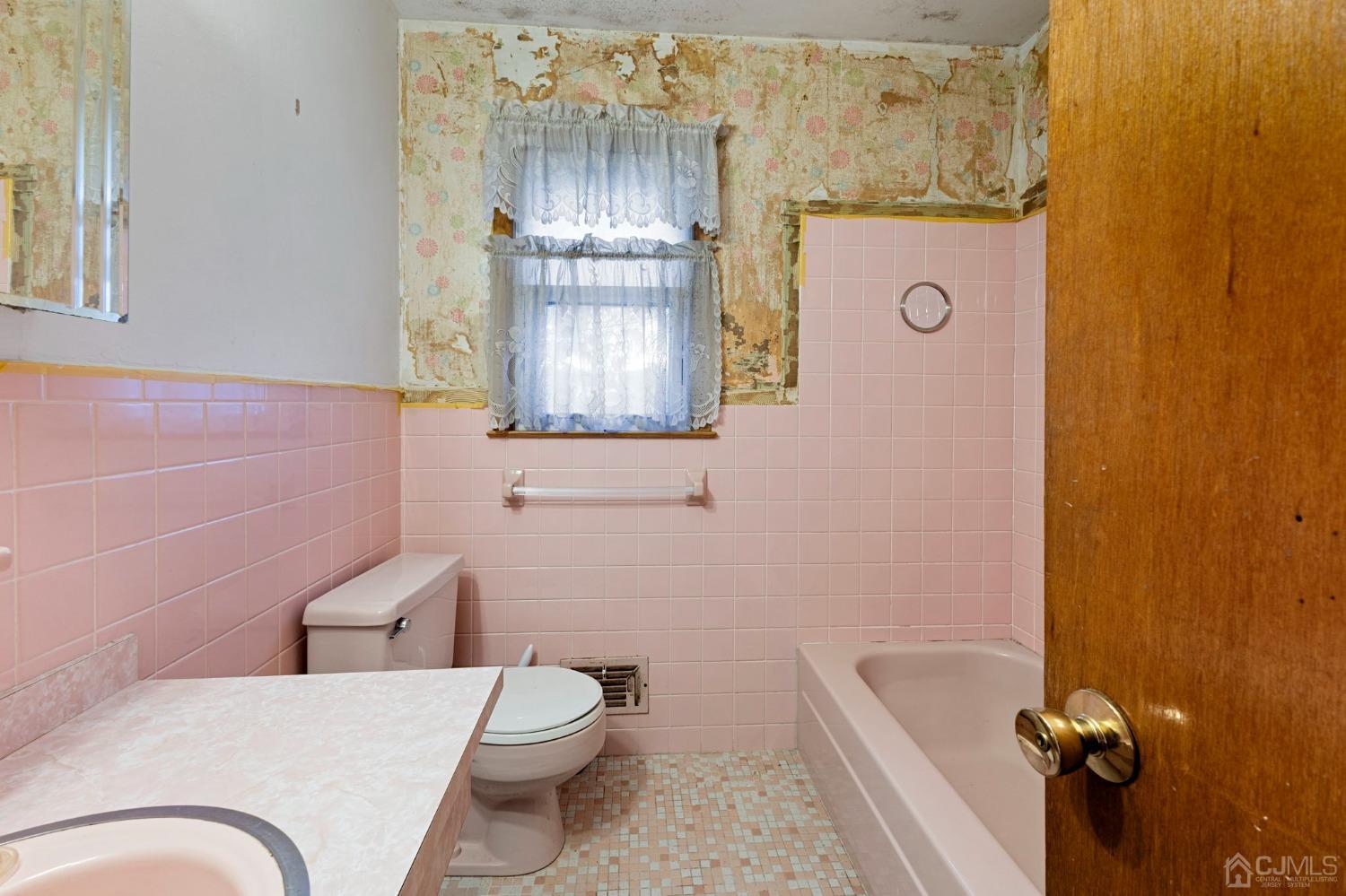 8 Mathison Place Milltown, NJ 08850 - Photo 11 of 17 a bathroom with a granite countertop toilet and a sink