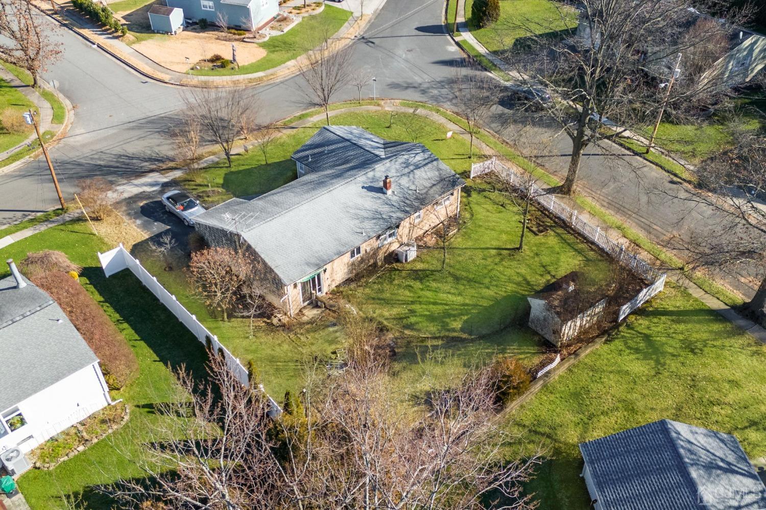 8 Mathison Place Milltown, NJ 08850 - Photo 14 of 17 a bird view of a house with a yard