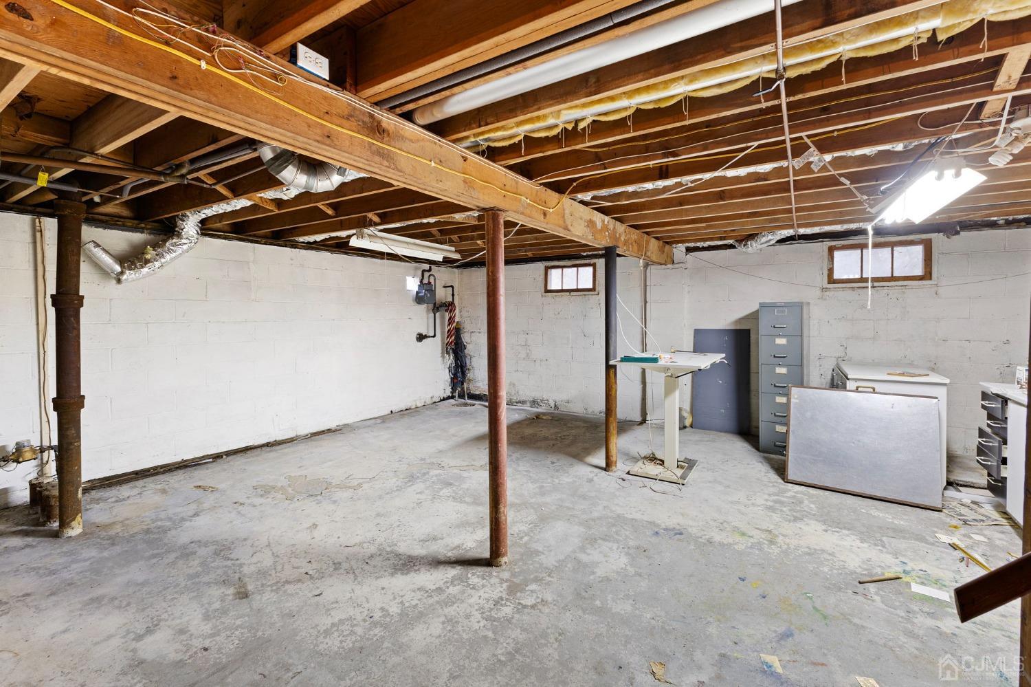 8 Mathison Place Milltown, NJ 08850 - Photo 8 of 17 a view of a storage room