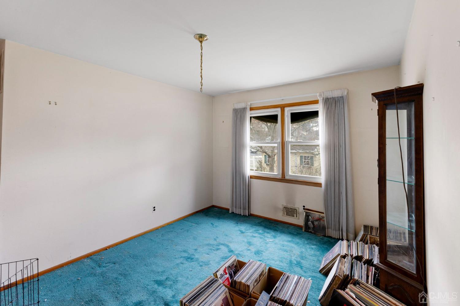 8 Mathison Place Milltown, NJ 08850 - Photo 9 of 17 a view of an empty room and window