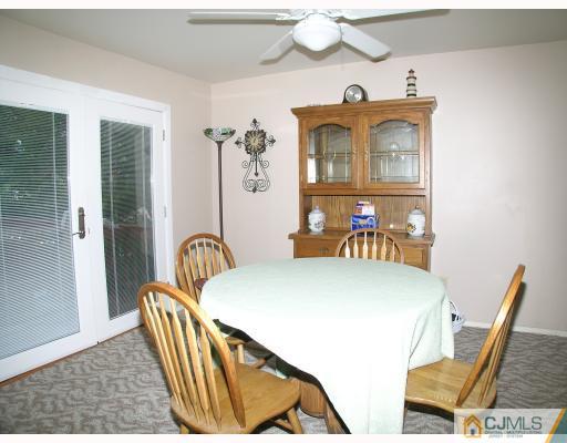 2 Lynnwood Road Edison, NJ 08820 - Photo 3 of 8 a bedroom with furniture and a window
