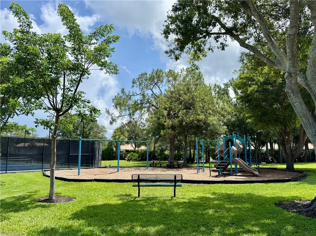 7057 Timberland Circle Naples, FL 34109 - Photo 19 of 22 a view of a park with large trees