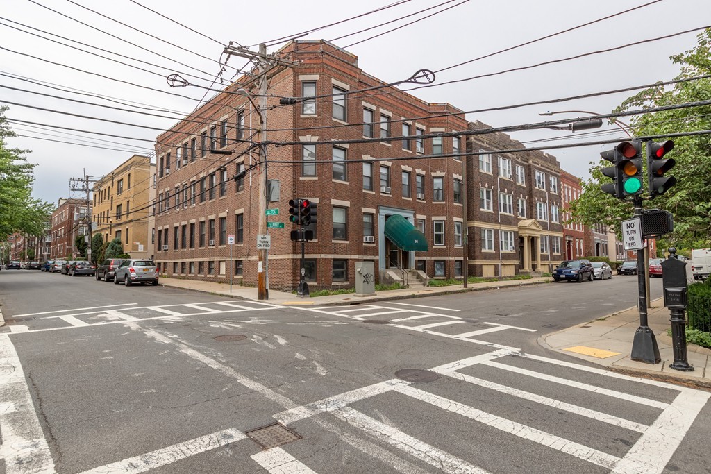 316 Summit Avenue, Unit 6 Boston, MA 02135 - Photo 1 of 9 a view of a building and a street