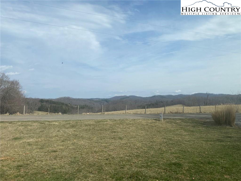 125 Moxley Ridge Road Sparta, NC 28675 - Photo 30 of 30 a view of lake with mountain
