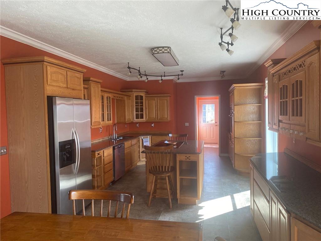 125 Moxley Ridge Road Sparta, NC 28675 - Photo 3 of 30 a view of a dining room with furniture
