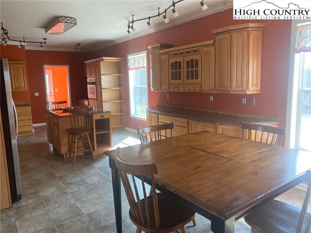 125 Moxley Ridge Road Sparta, NC 28675 - Photo 4 of 30 a view of a dining room with furniture