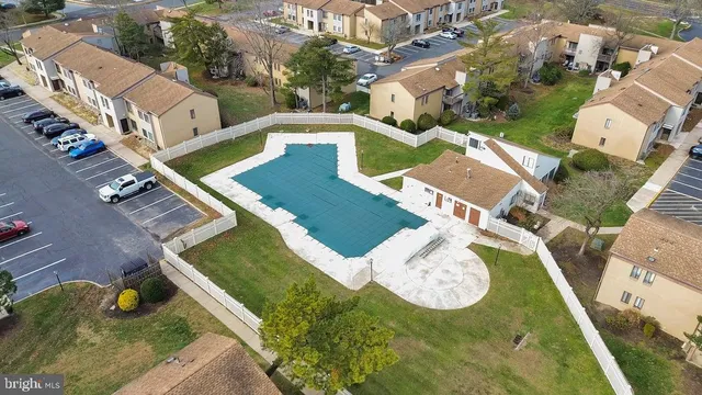 an aerial view of house with yard