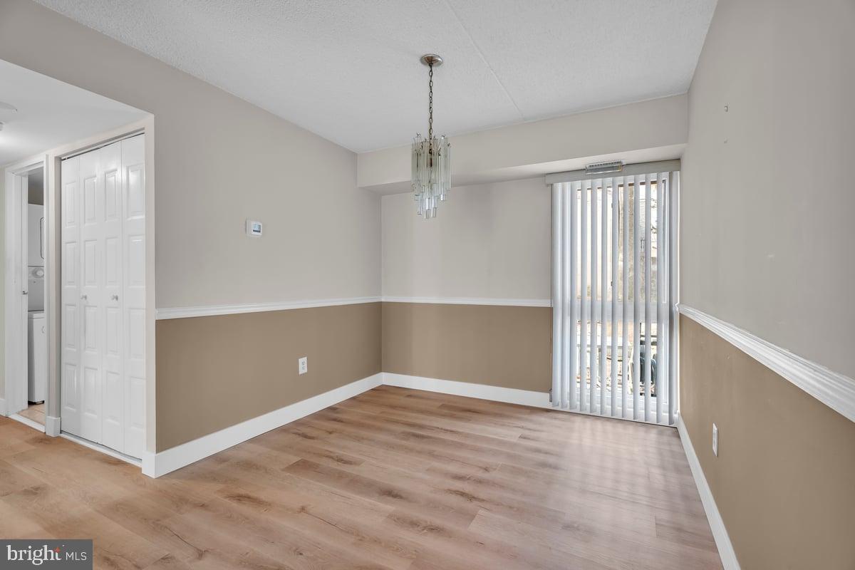 223 James Marlton, NJ 08053 - Photo 7 of 28 wooden floor in an empty room with a window