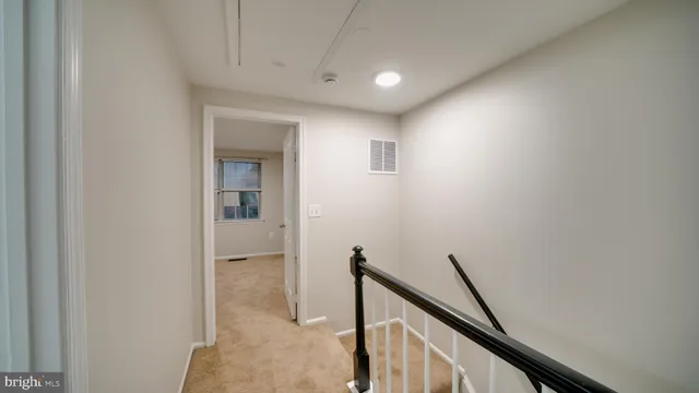 a view of hallway with stairs