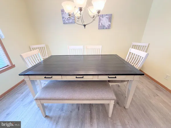 a view of table tennis room with wooden floor