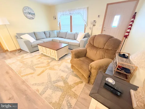 a living room with furniture and a couch