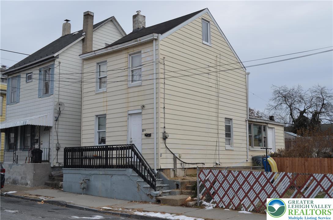 320 South 11th Street Easton, PA 18042 - Photo 2 of 2 a front view of a house with wooden fence