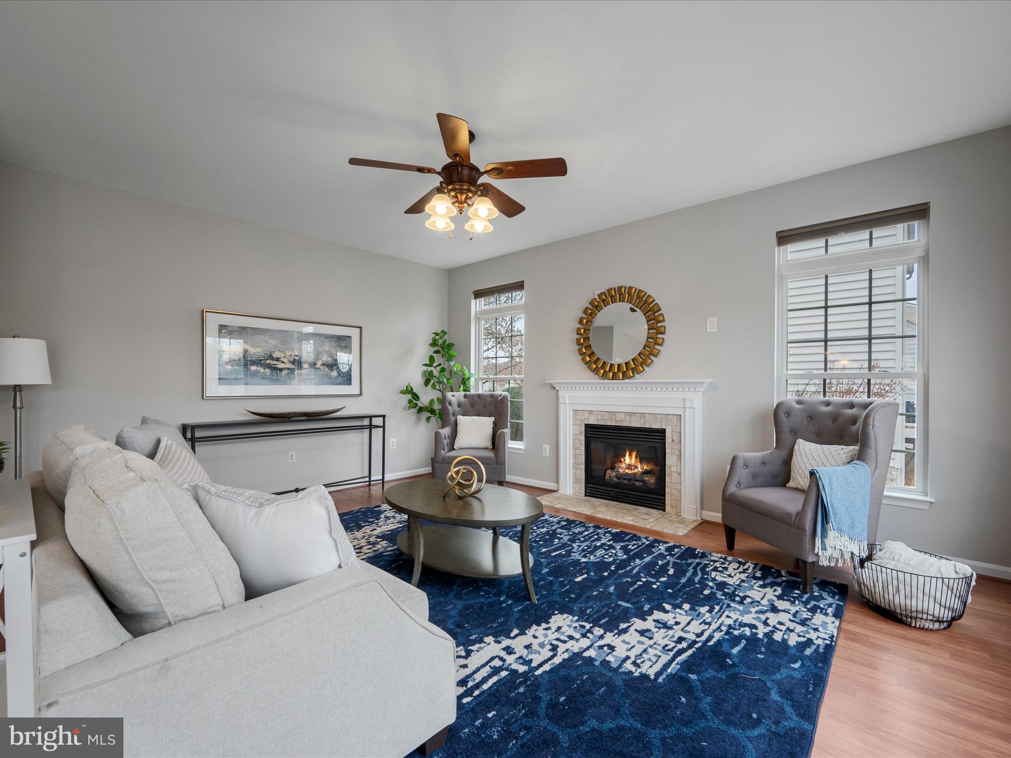 26 Limestone Way Fredericksburg, VA 22406 - Photo 23 of 67 a living room with furniture a fireplace and wooden floor