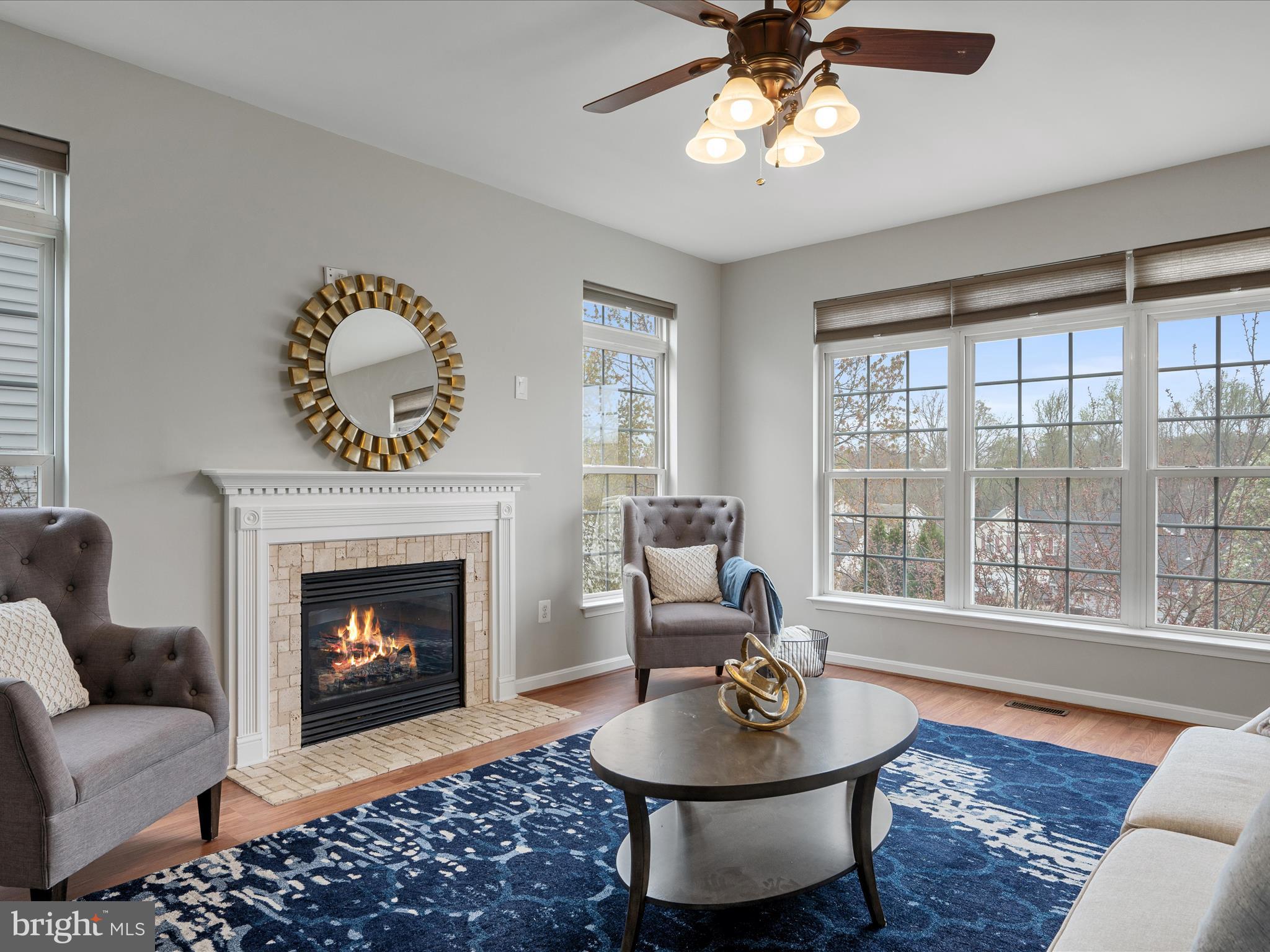 26 Limestone Way Fredericksburg, VA 22406 - Photo 24 of 67 a living room with furniture a window and a fireplace