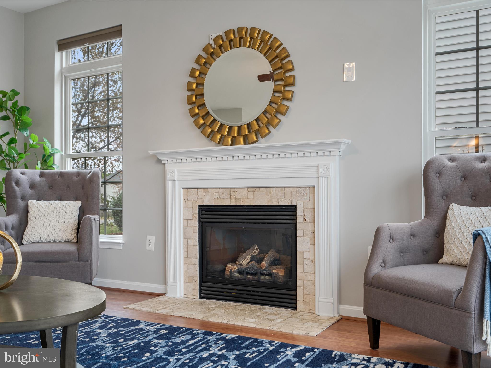 26 Limestone Way Fredericksburg, VA 22406 - Photo 25 of 67 a living room with a couch and a fireplace