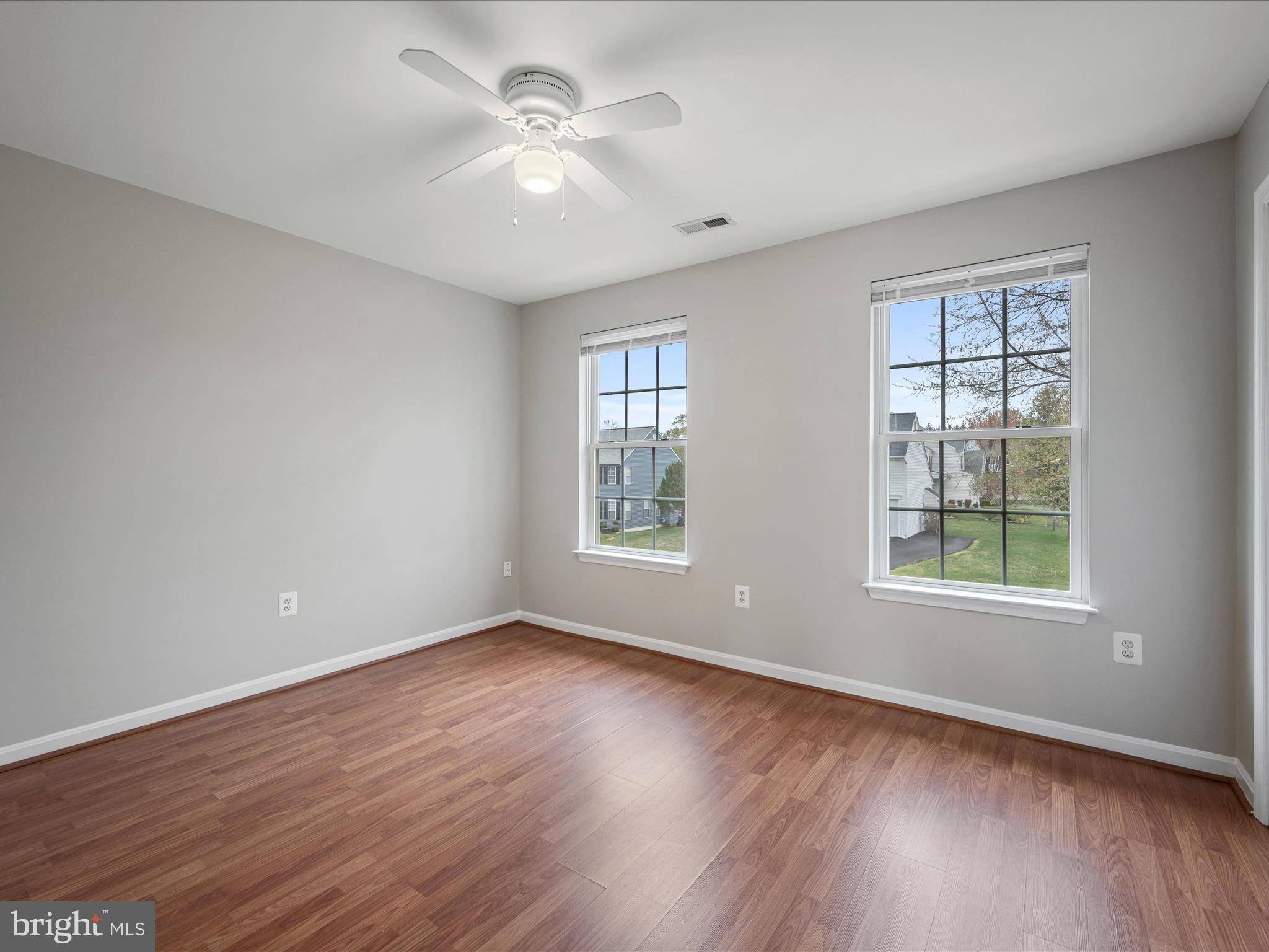 26 Limestone Way Fredericksburg, VA 22406 - Photo 30 of 67 a view of an empty room with wooden floor and a window