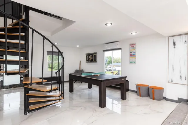 a view of a workspace with furniture