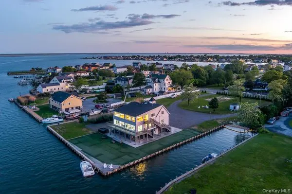 an aerial view of a house with a garden
