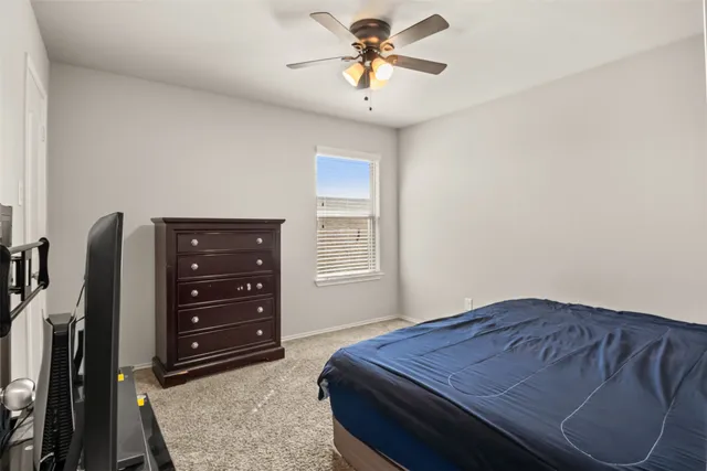 a view of a swimming pool with a yard