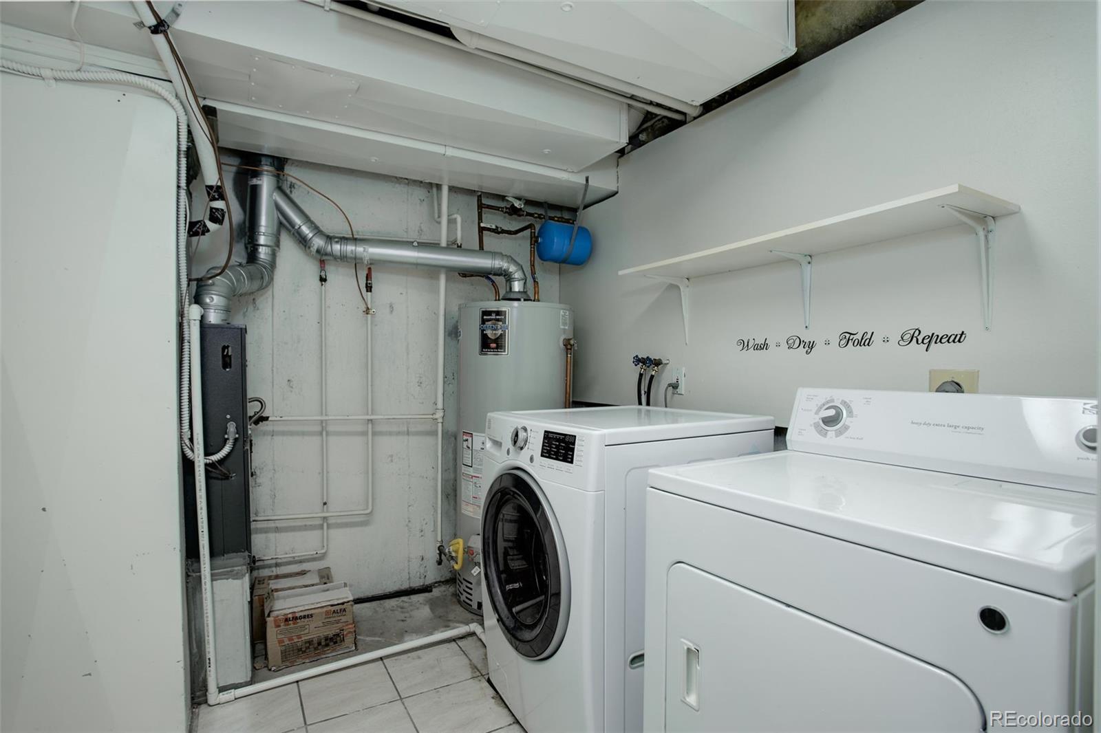 12132 Bannock Circle, Unit E Westminster, CO 80234 - Photo 19 of 26 a utility room with dryer and washer