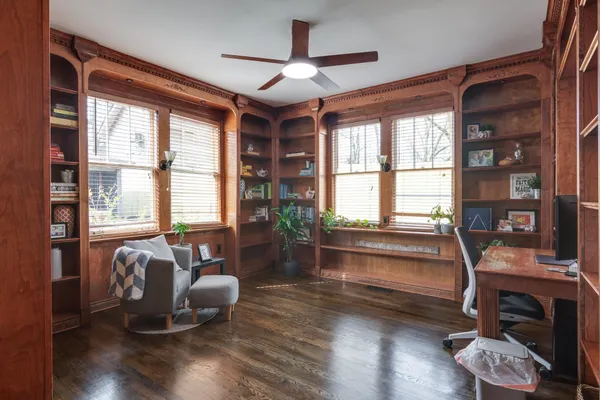 a bedroom with furniture and window