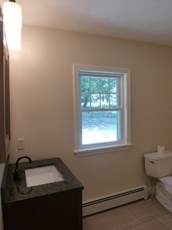 Lot 1 Baker Hill Road Spencer, MA 01562 - Photo 14 of 28 a room with a toilet window and vanity