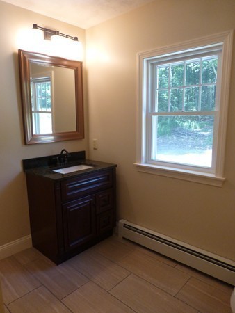 Lot 1 Baker Hill Road Spencer, MA 01562 - Photo 15 of 28 a room with a window and a mirror