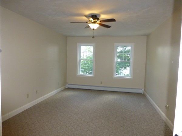 Lot 1 Baker Hill Road Spencer, MA 01562 - Photo 18 of 28 an empty room with a window and a fan