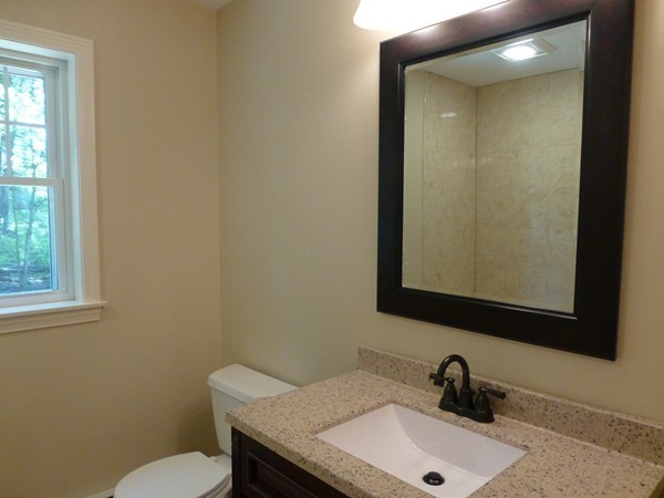 Lot 1 Baker Hill Road Spencer, MA 01562 - Photo 21 of 28 a bathroom with a toilet sink and mirror